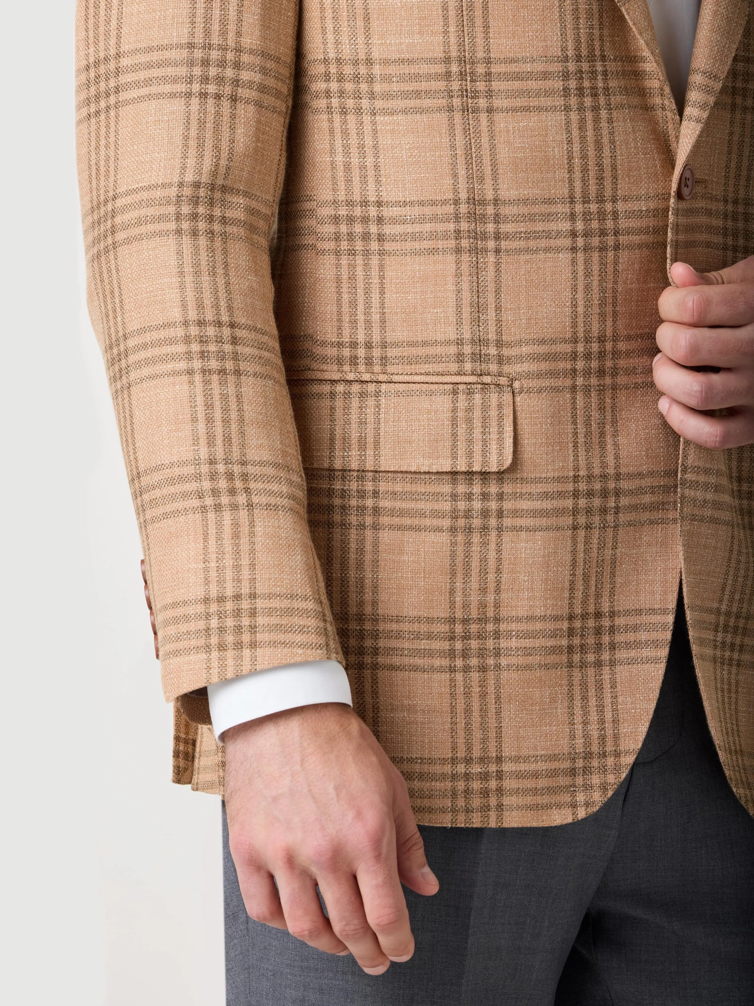 Craftsmanship is revealed in the details.⁠
⁠
A closer look at our new Copper Plaid Soft Coat from the Spring/Summer 2026 Collection. Woven by the prestigious Italian mill Drago, the luxurious blend of wool, silk, and linen creates rich texture, depth