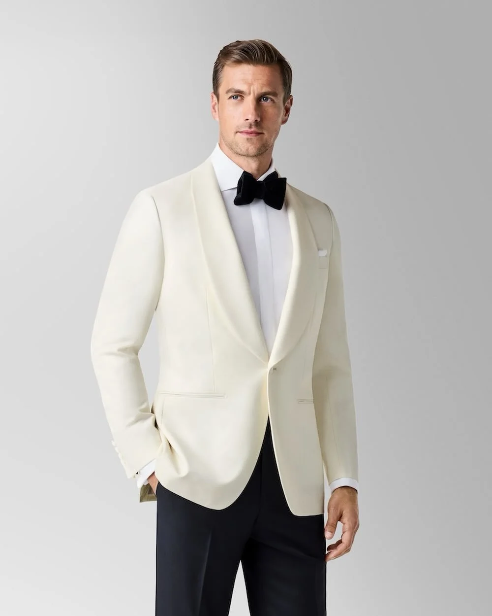 A modern expression of timeless formalwear.⁠
⁠
Our 1-Button Shawl Collar Ivory Dinner Jacket brings refined elegance to any formal occasion. Featuring a classic shawl collar and clean tailored silhouette, this standout piece delivers sophistication w