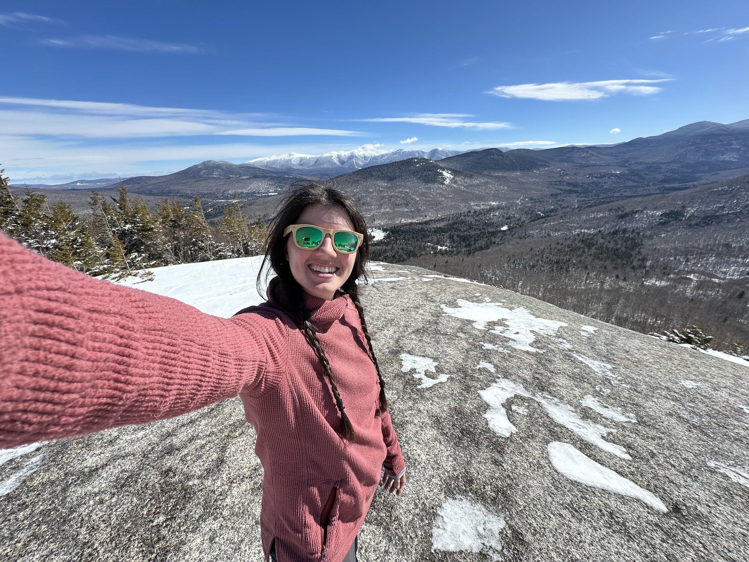 girl taking selfie on middle sugarloaf in the white mountains