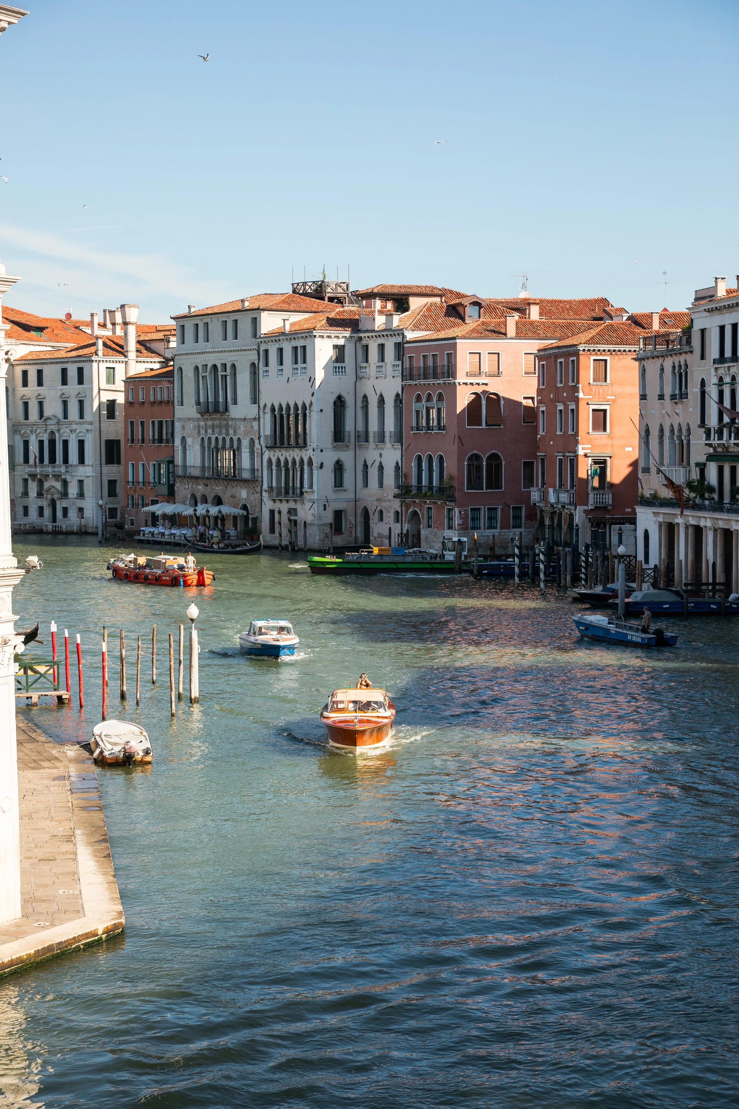 boats in canal in venice