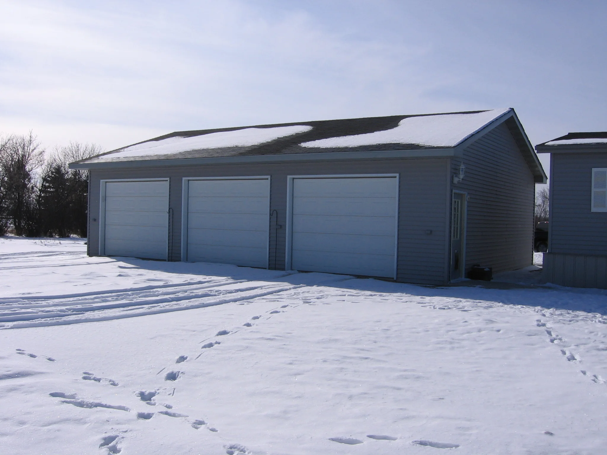3 stall garage added onto an existing home