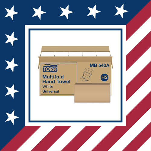 Packaging box of Tork multifold white hand towels with a roll of towels in front, featuring an American flag-themed background.