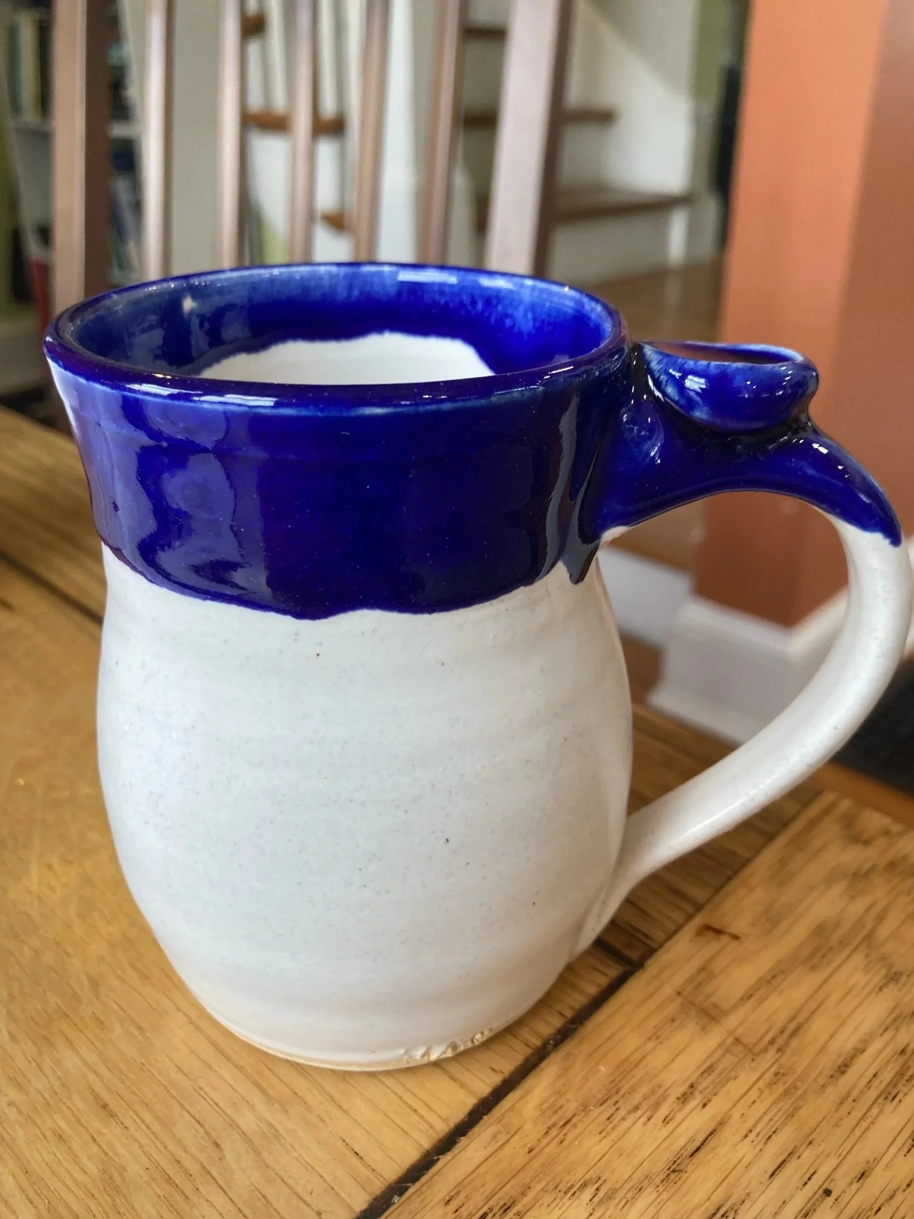 Curved White and Cobalt Mug