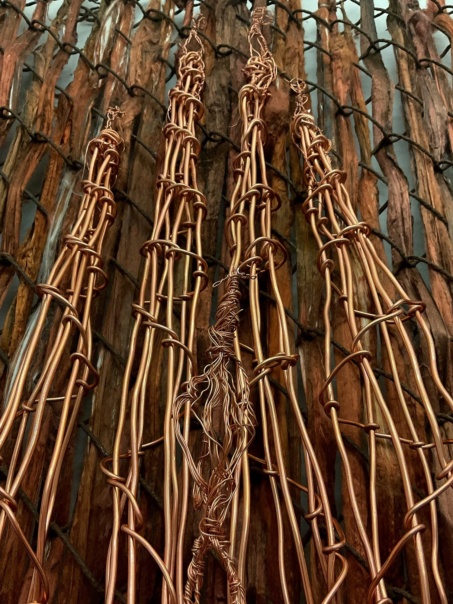 The Sacred Family church emerging from a copper quantum computer