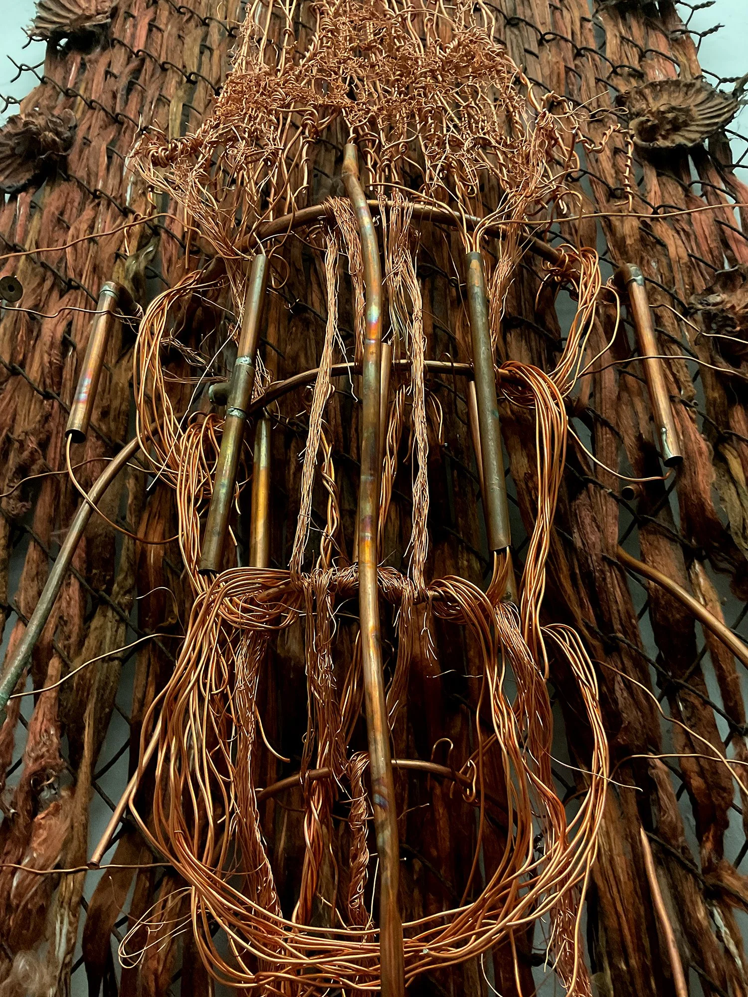 The Sacred Family church emerging from a copper quantum computer