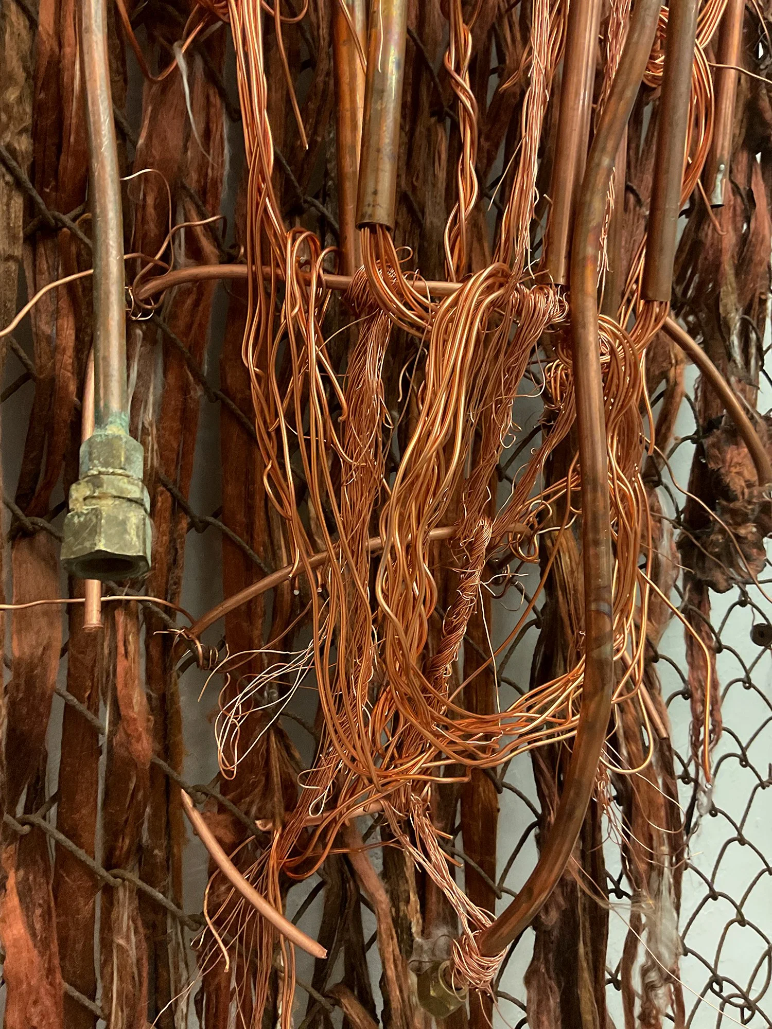 The Sacred Family church emerging from a copper quantum computer