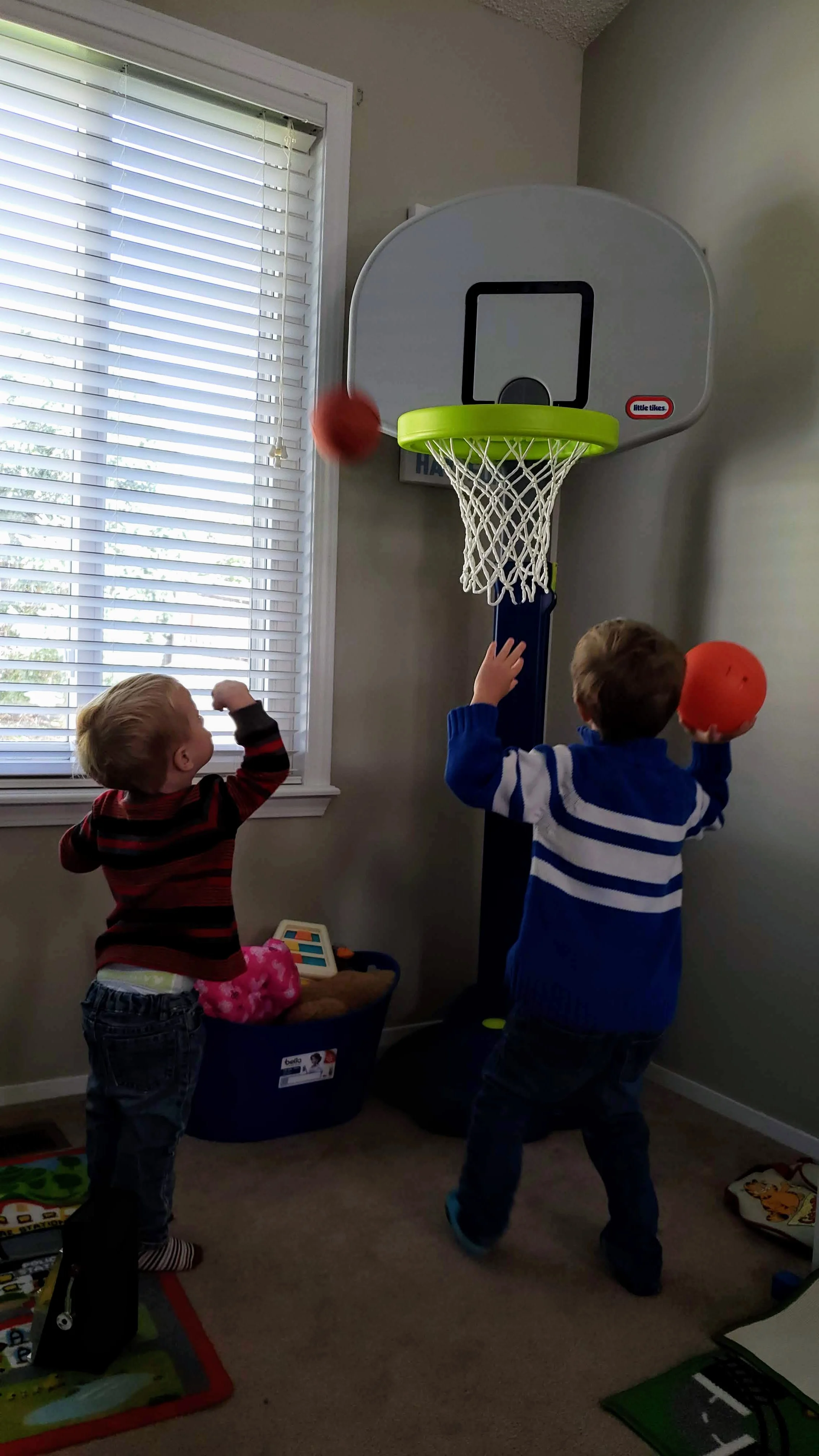 Most of the time, the playroom is a basketball court. #boyswillbeboys Basketball hoop