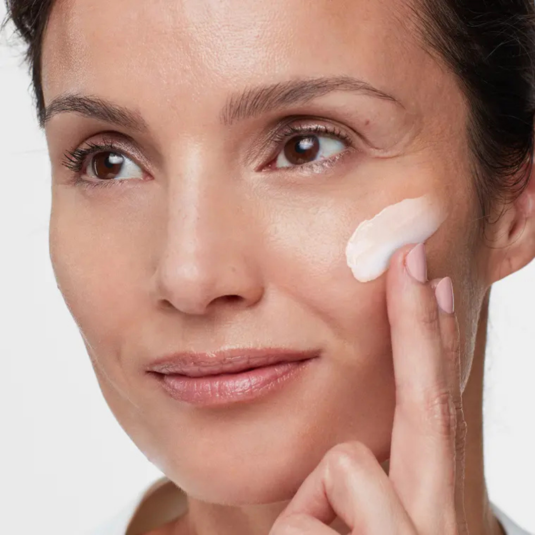 HydroPeptide Solar Defense Tinted mineral sunscreen applied to the face for lightweight tinted coverage