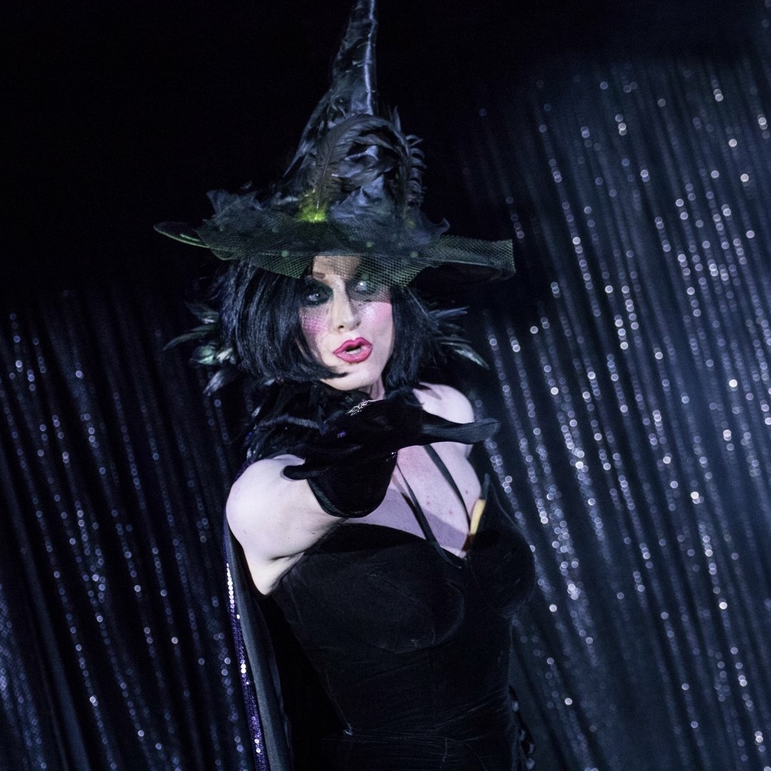 Minnie Cooper as the black witch. 