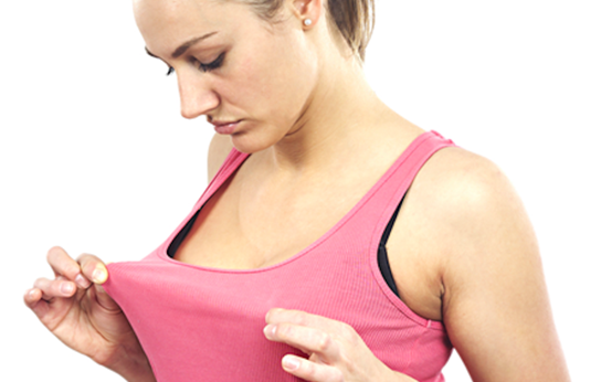 woman checking breasts.png