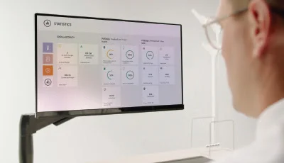 man viewing data on screen.jpg