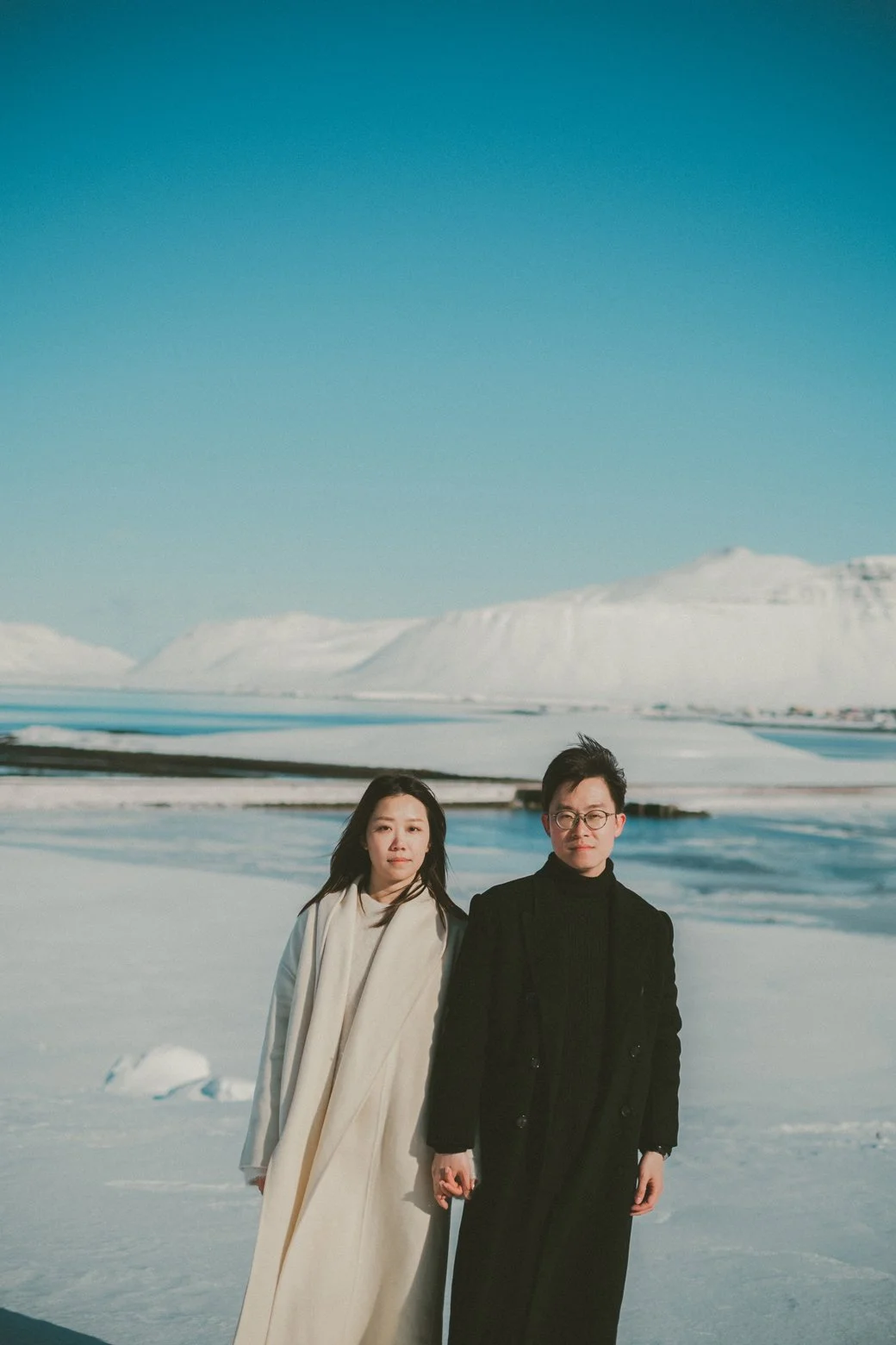 Iceland elopement photographer with couple at Kirkjufell