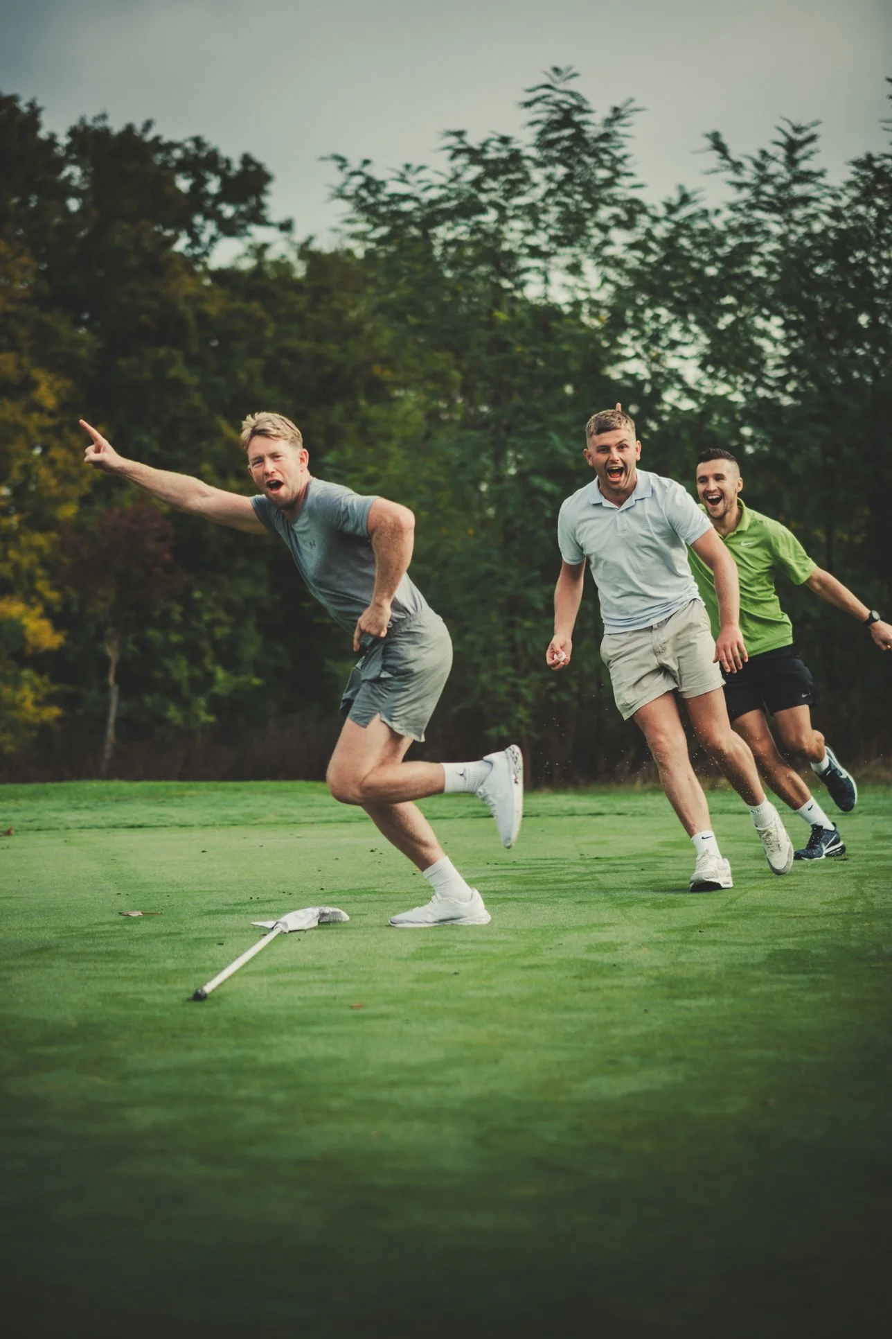 groom golfing with friends morning manoir de longeveau wedding