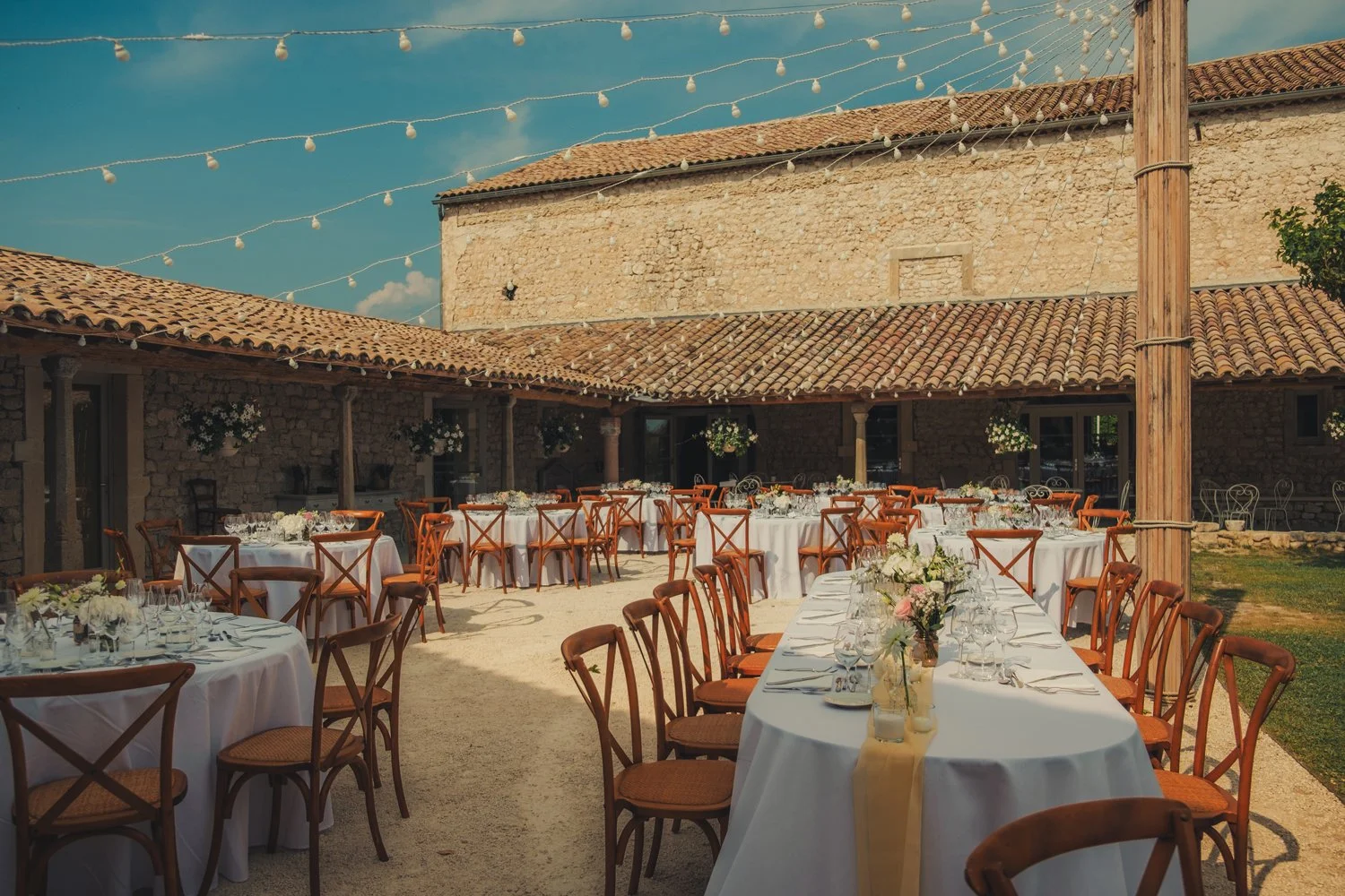Outdoor dining area of a wedding at Domaine de Sarson in Provence.