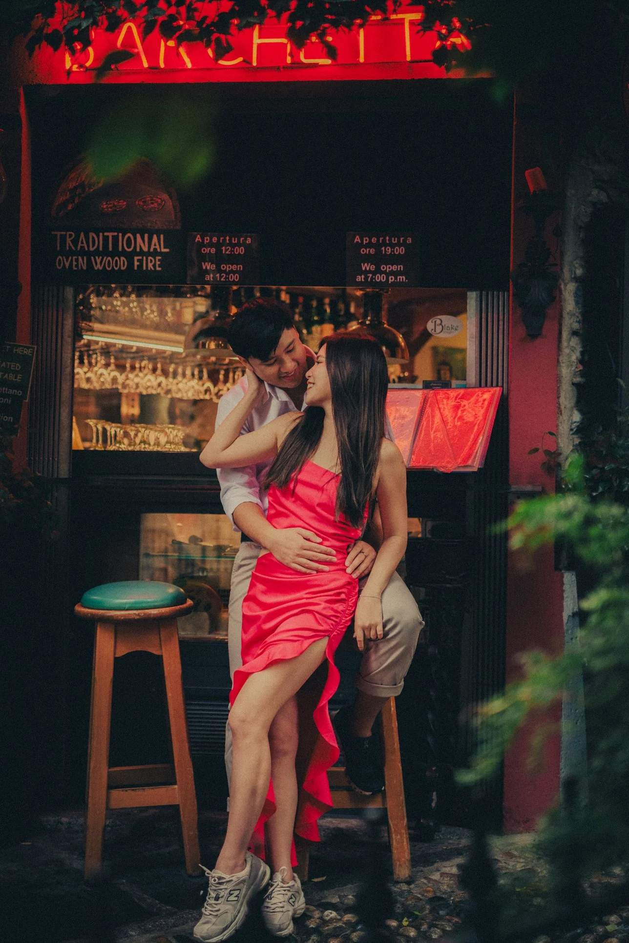 Couple in their colorful casual outfits having an engagement photo session in Bellagio, Lake Como.