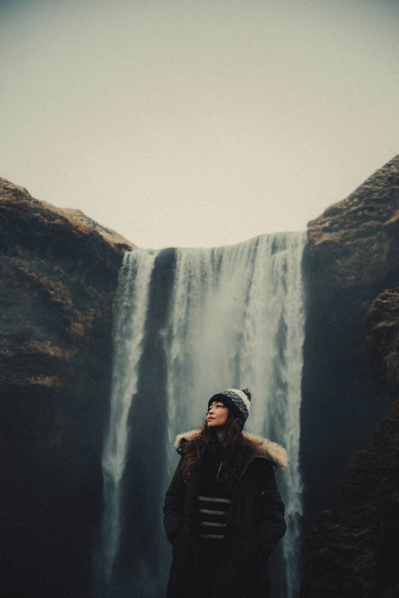 iceland elopement photographer capturing at the waterfall