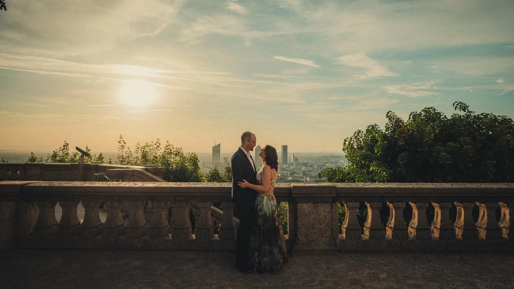Panoramic view of Lyon at Fourviere with a couple during vow renewal photo session.