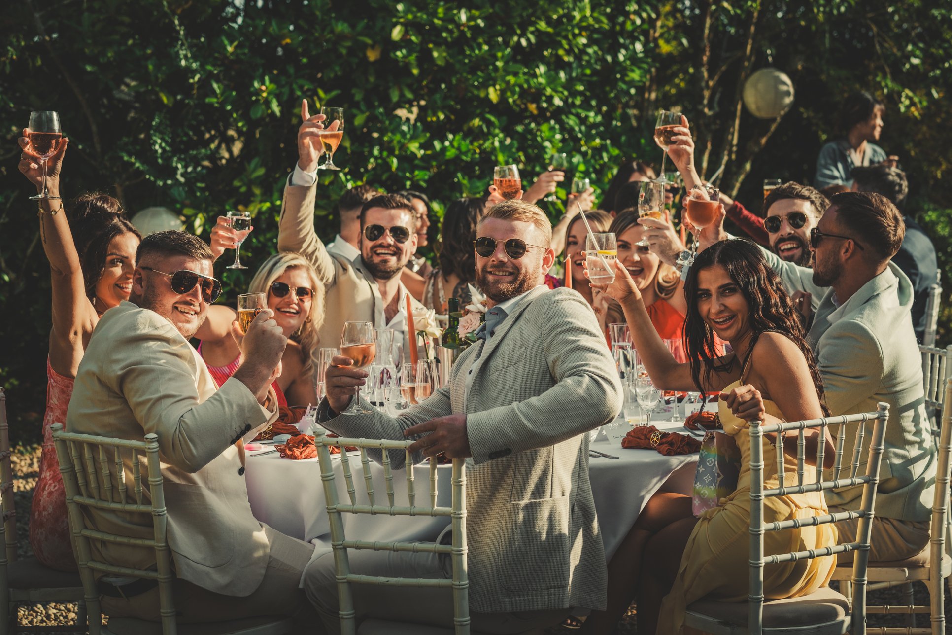 guests during the outdoor dinner time having fun at the wedding