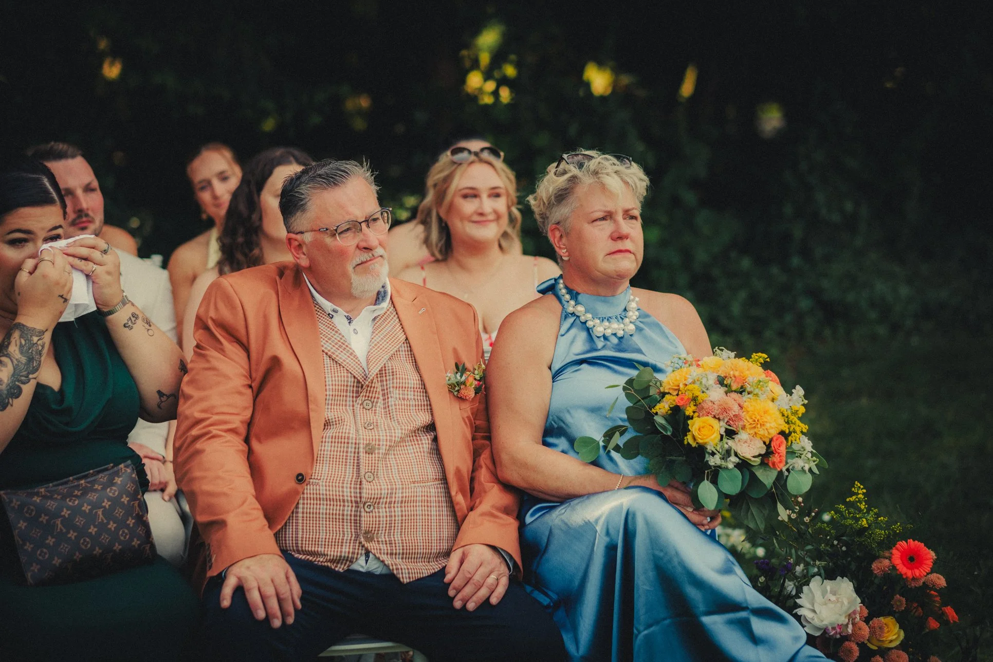Family members emotional during wedding ceremony