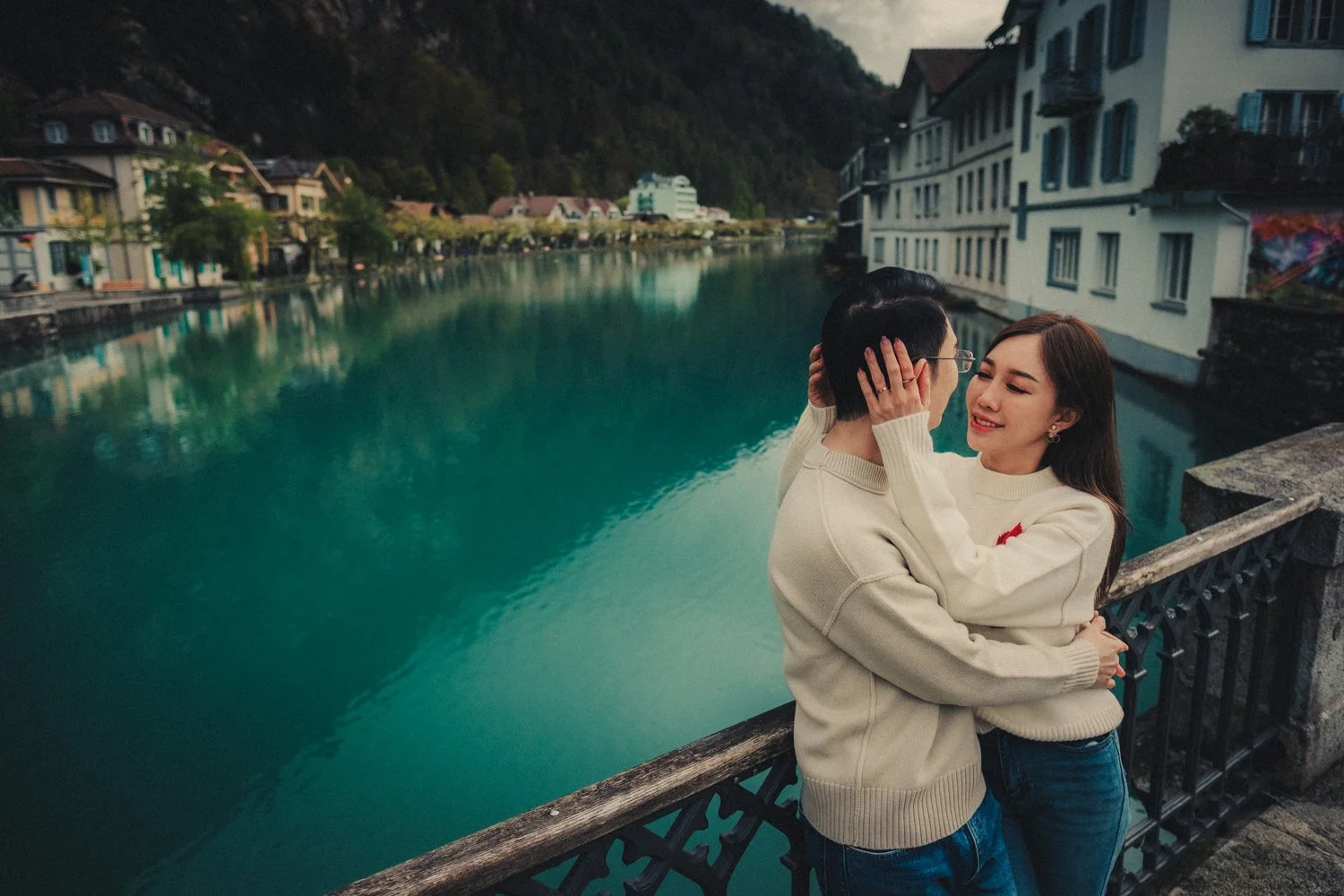 Candid honeymoon moment while exploring the streets of Interlaken, Switzerland.