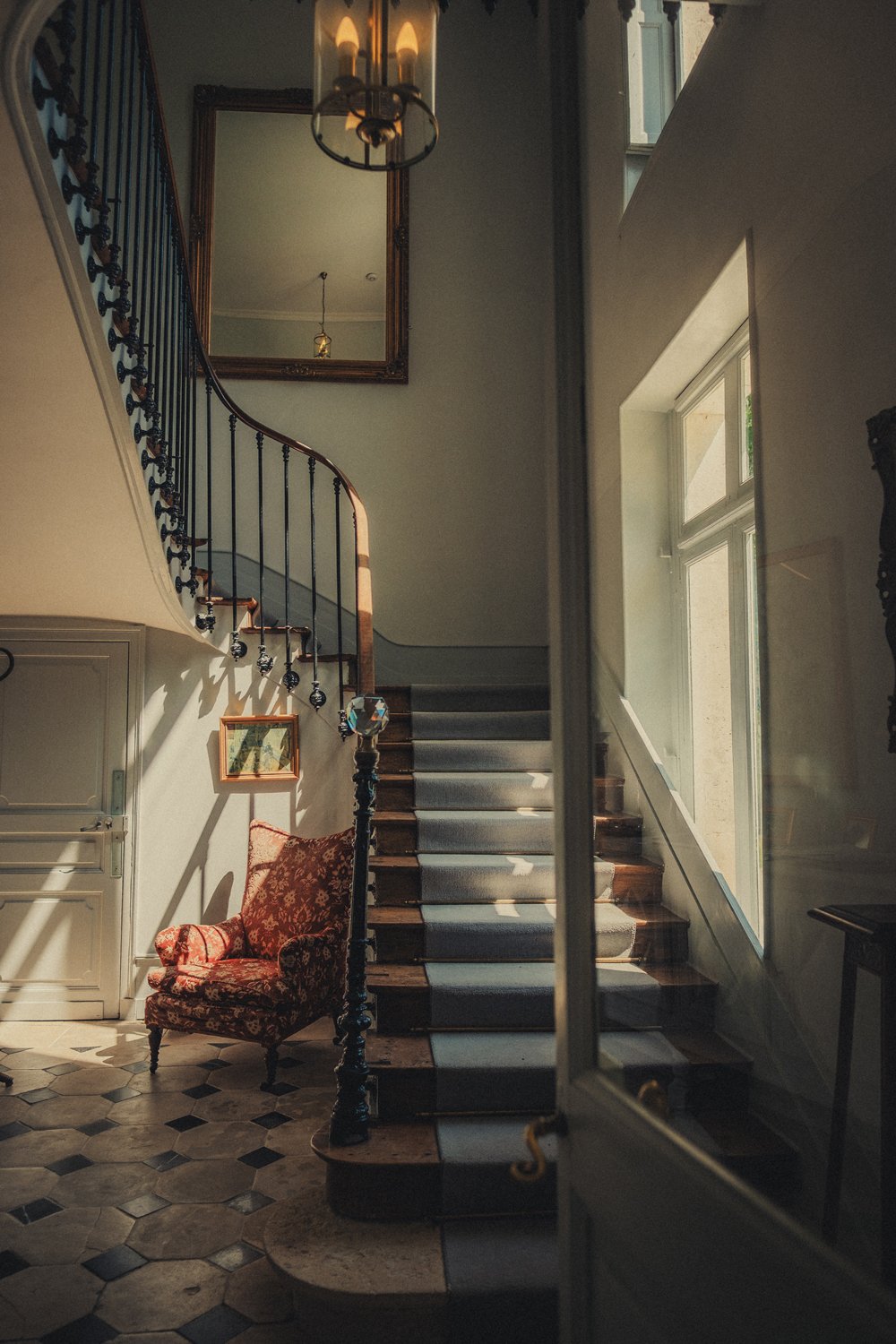 Interior staircase inside Château La Gauterie Dordogne wedding venue