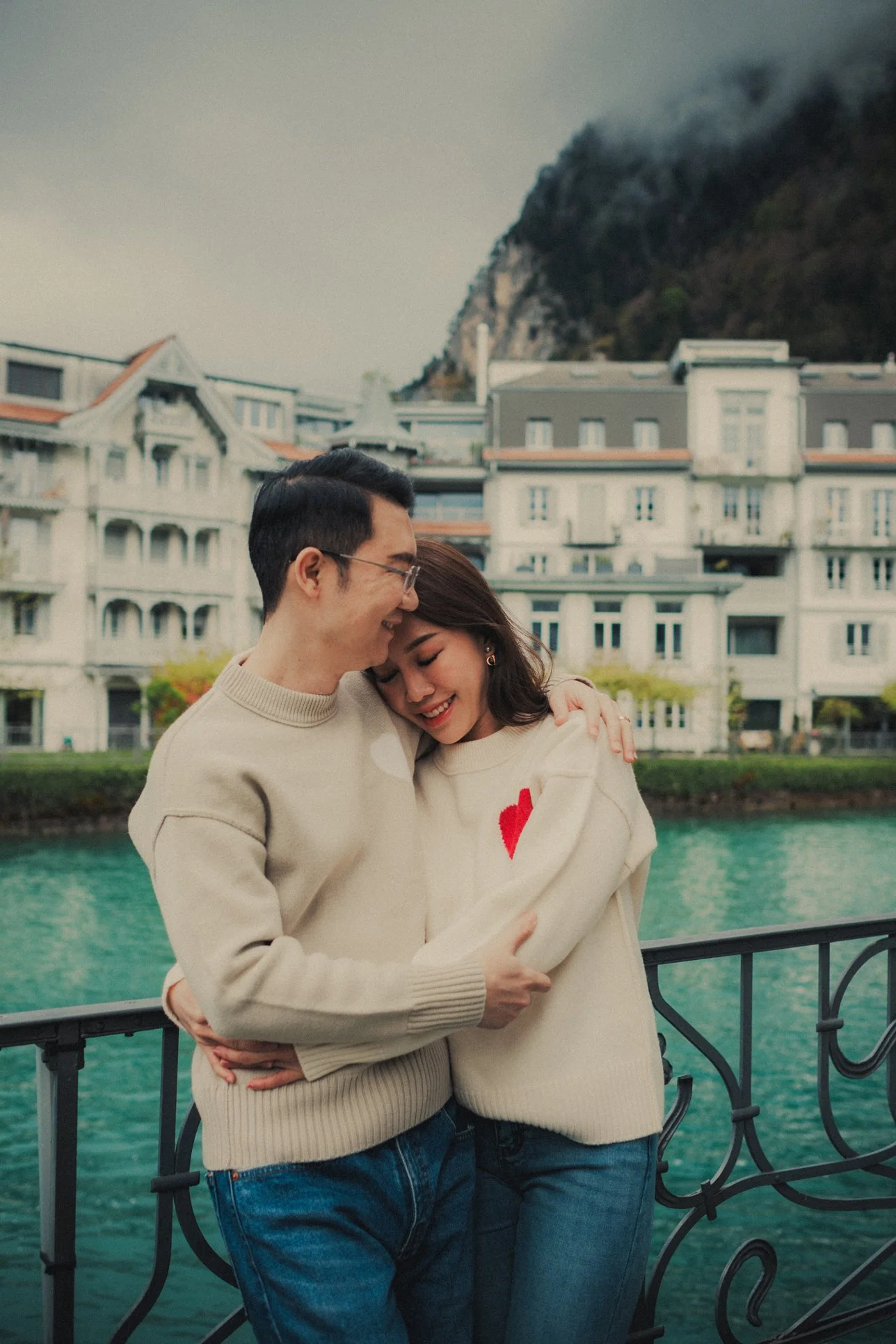 Couple hugging in the heart of the city in Interlaken during their honeymoon.