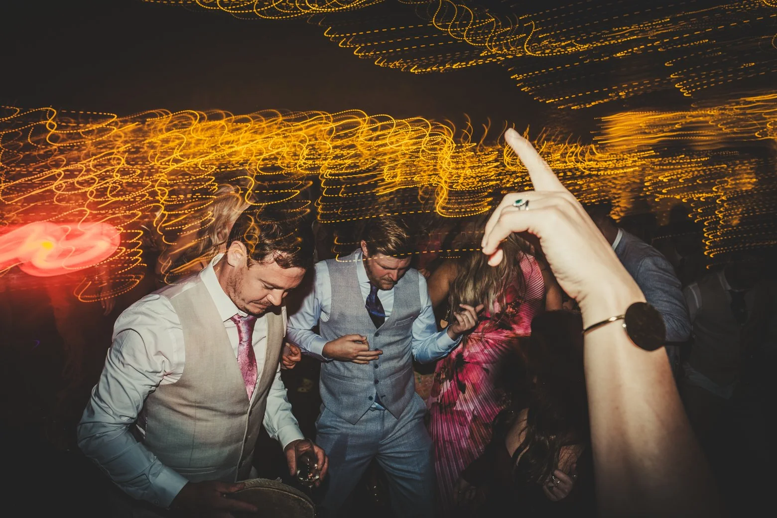 wedding guests dancing night