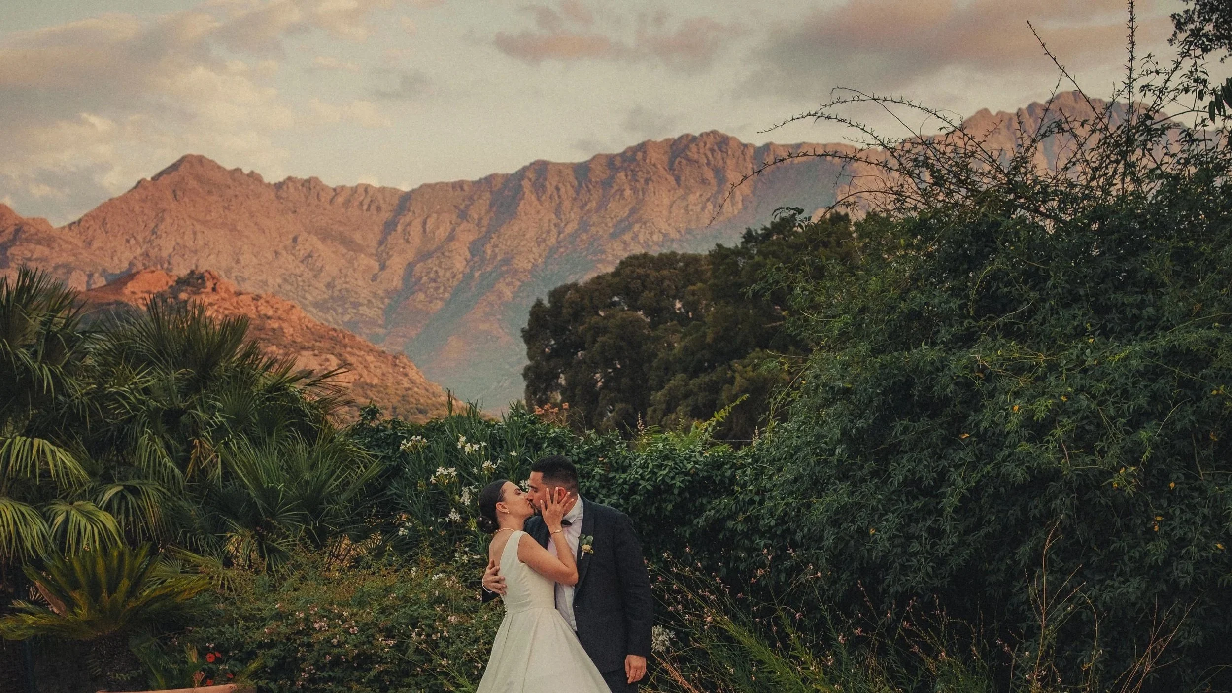 Wedding couple with Corsican mountains in the background