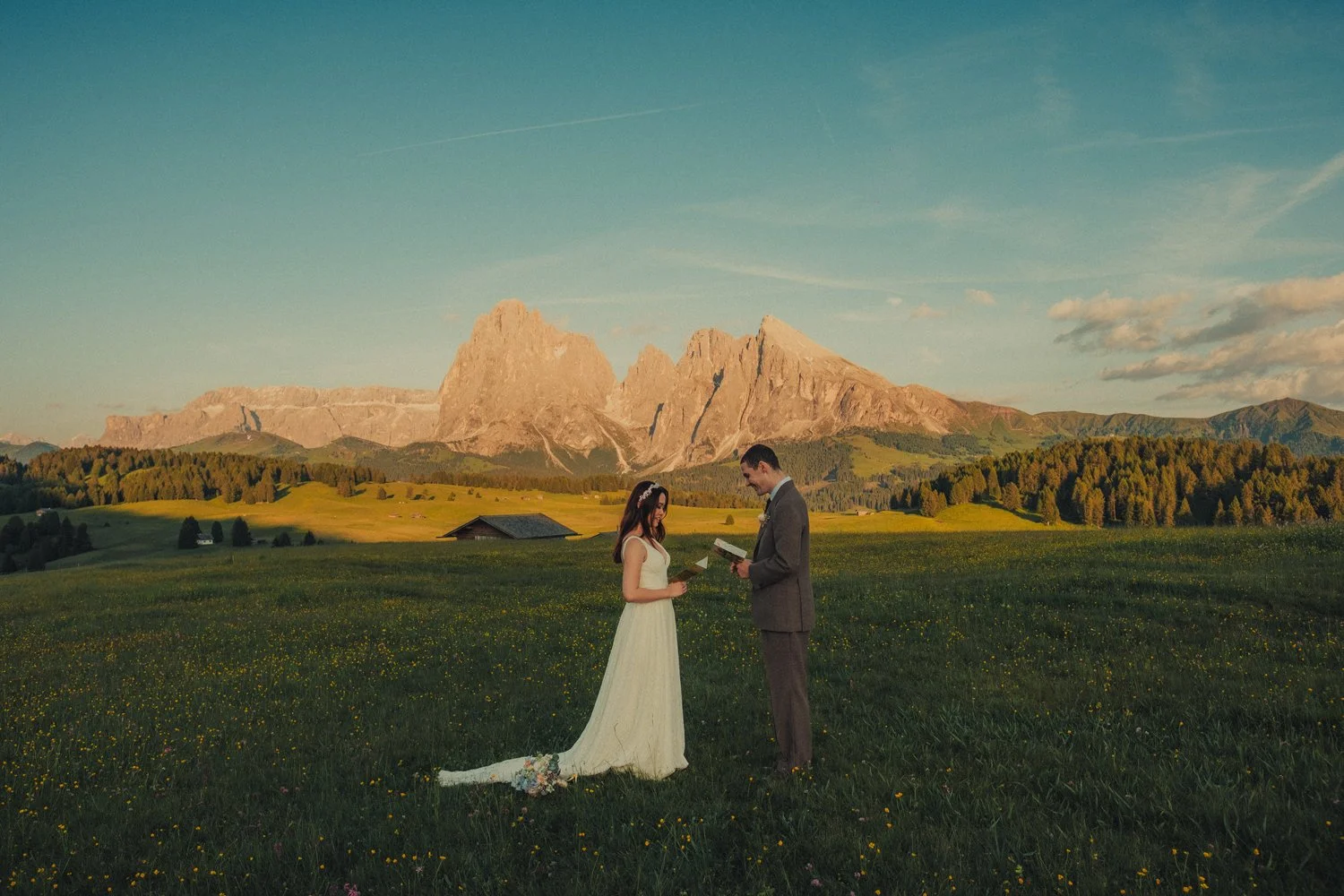 Vows moment during elopement in Dolomites Italy.