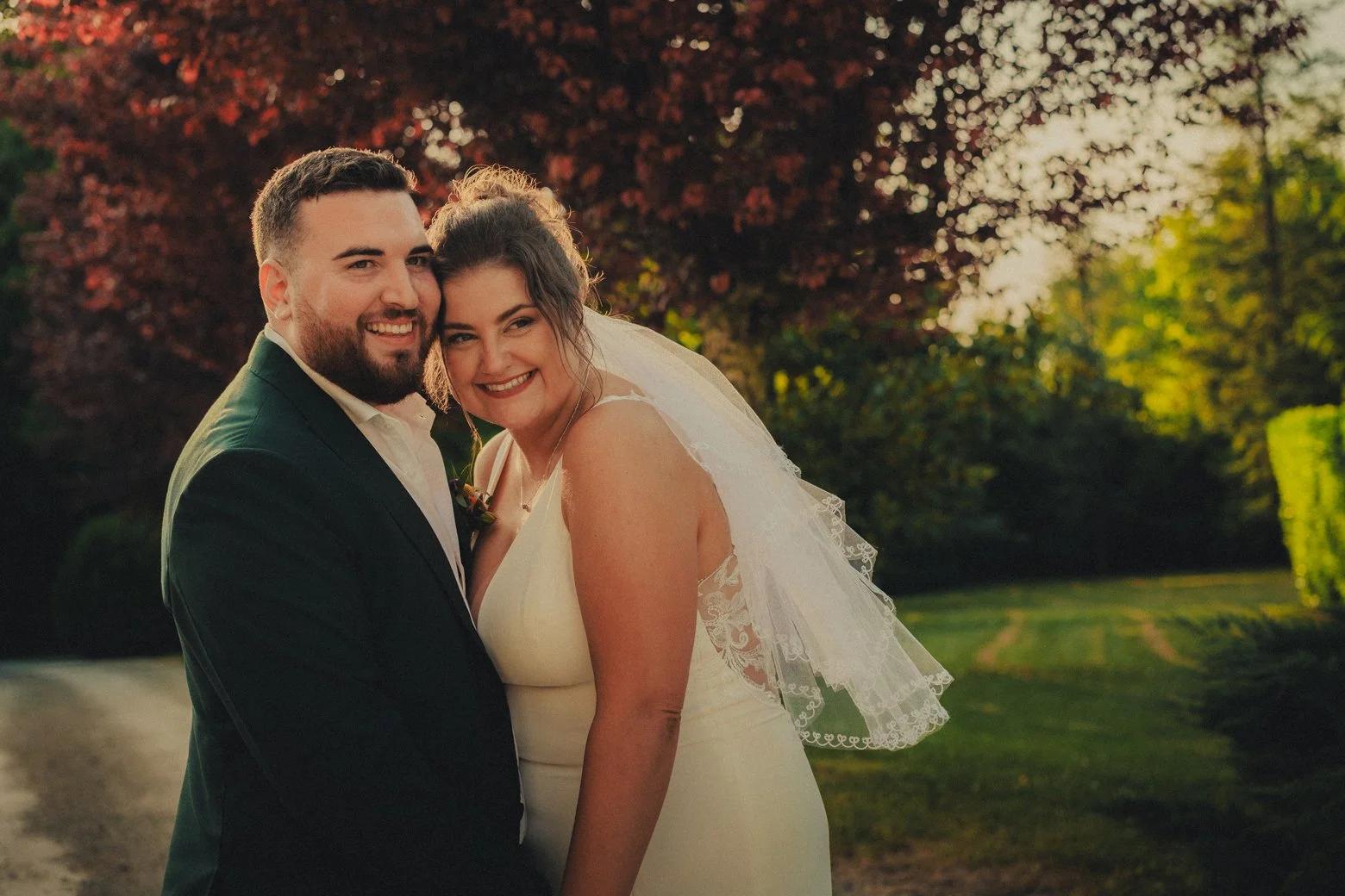 Couple portrait in garden of Château La Gauterie