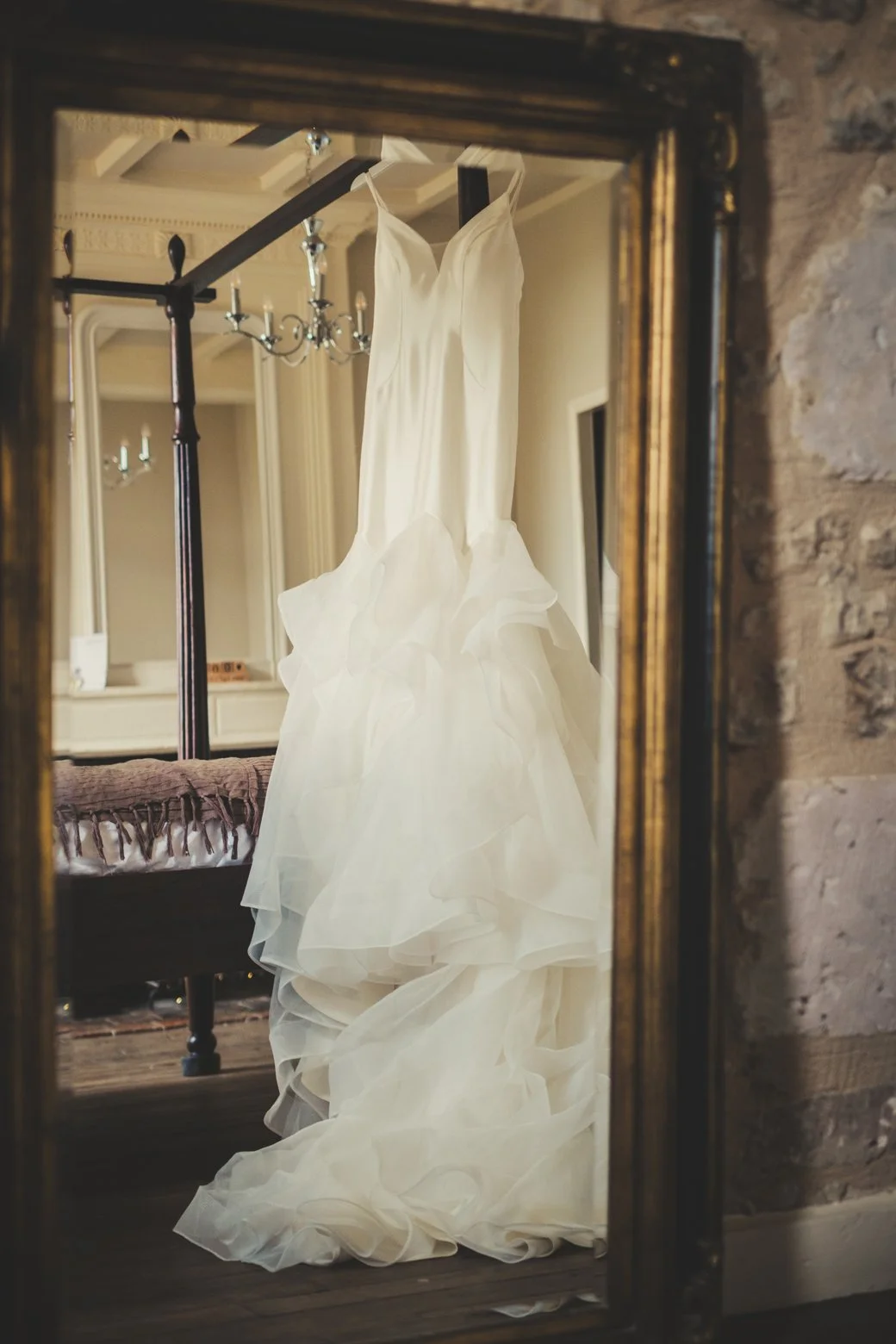 wedding dress hanging detail manoir de longeveau