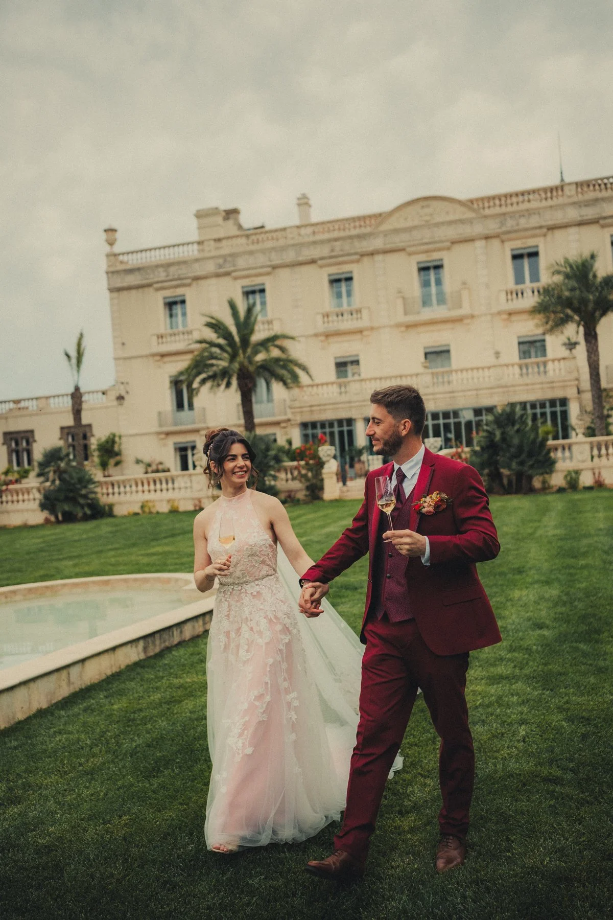 Portrait of bride and groom in front of wedding Chateau in Provence