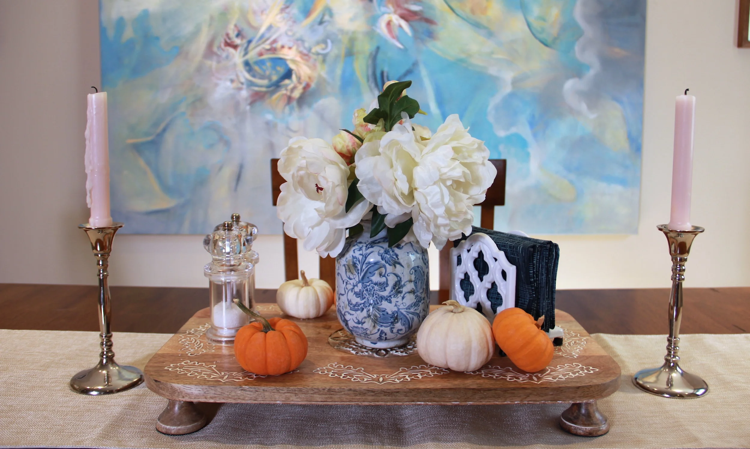 Fall Tablescape. The addition of mini pumpkins helps to give this simple arrangement an autumnal feel.