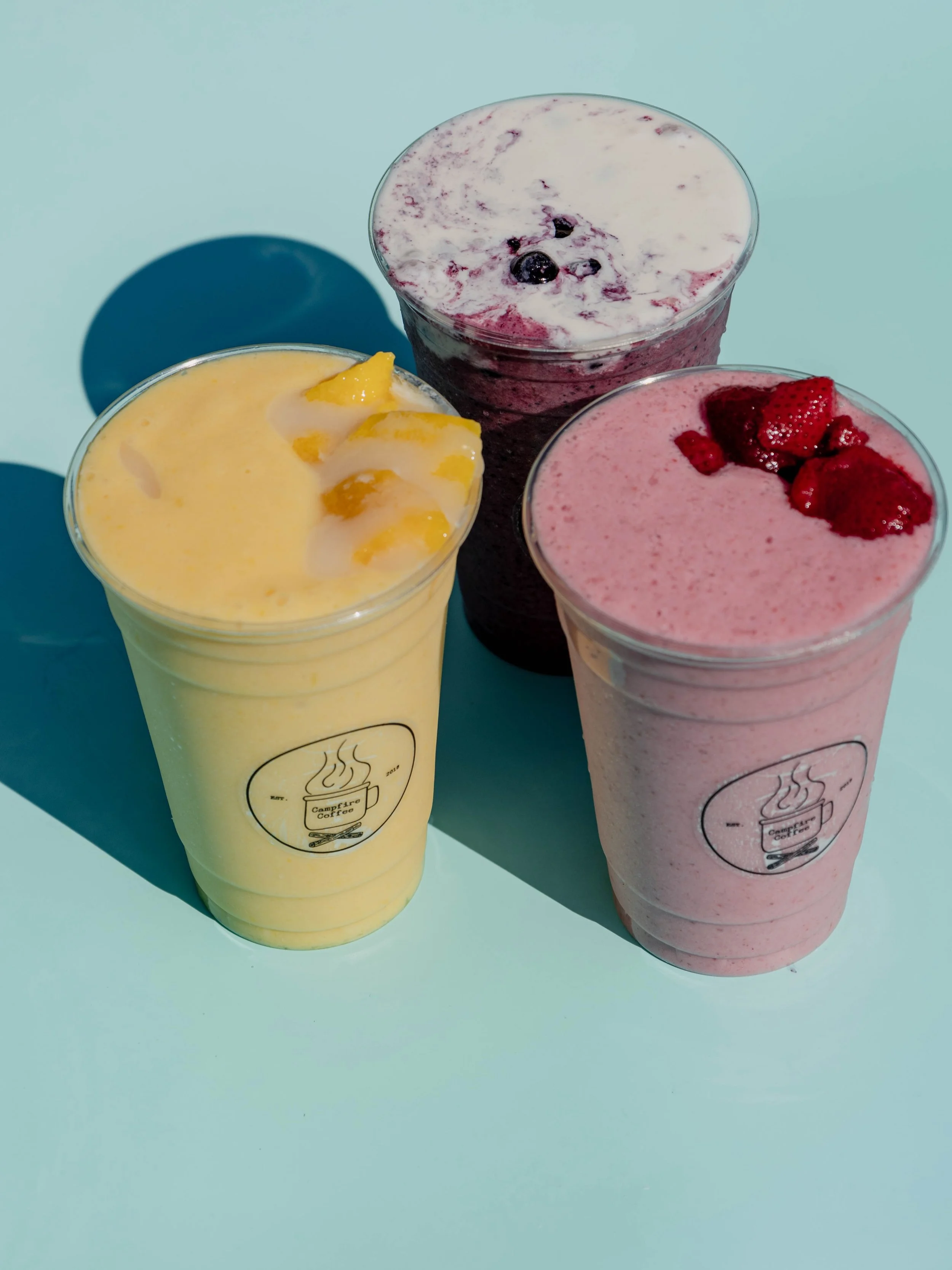 SUMMER SMOOTHIES are here &amp; staying for awhile 🌴🏖️🍋

We&rsquo;re bringing back a twist on our original smoothies we came out with last year because this summer needs these classics ✨

COCONUT MANGO 🥭🥥
mango, coconut, pineapple juice, milk &a
