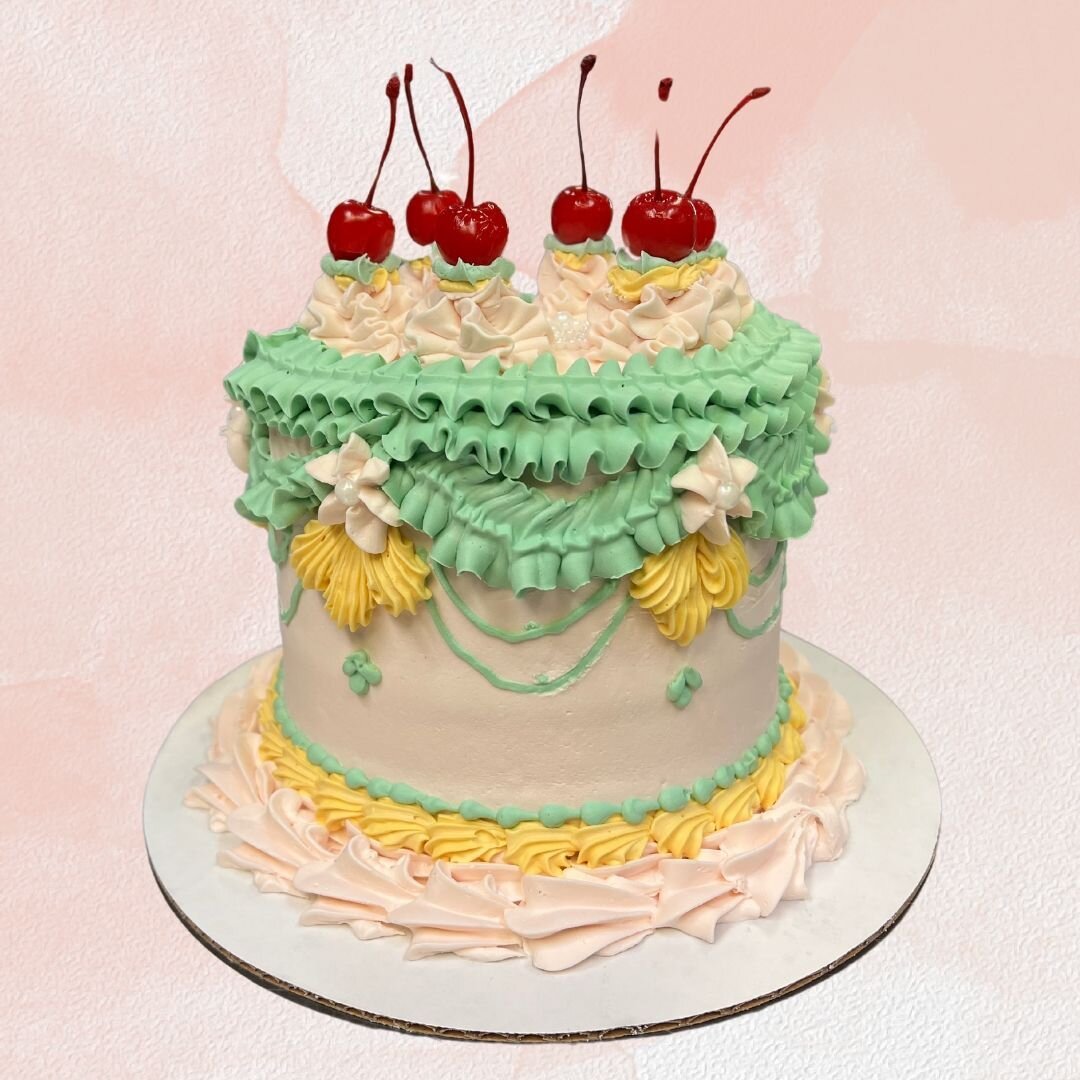 Indulge in a Slice of Heaven at Carolyn&rsquo;s Bake Shop! 

Discover our latest masterpiece: a whimsical cake that transcends mere dessert. 

Each layer is a canvas, meticulously crafted with love and artistry. 

Every bite is a symphony&mdash;a har