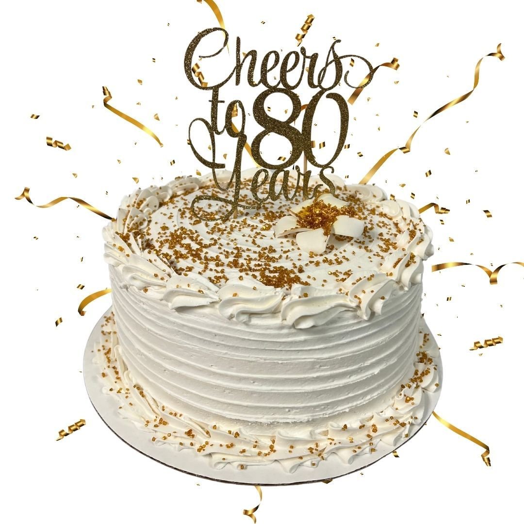 Cheers to 80 years! 🎂 Celebrate the milestones with Carolyn&rsquo;s Bake Shop where every cake is a toast to your special moments. Adorned with golden sprinkles and our signature creamy frosting, this cake is ready to be the centerpiece of your cele