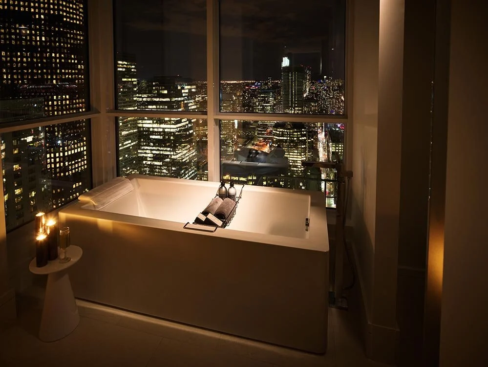 Architectural photo of bathtub with night sky