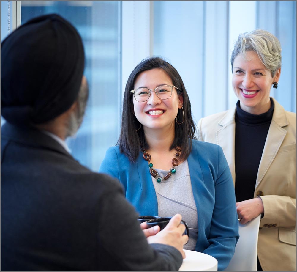 corporate lifestyle three executives laughing.jpg