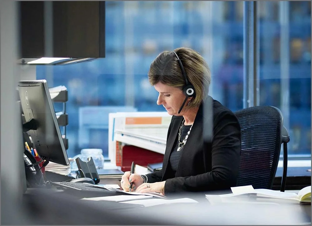 corporate lifestyle woman at desk.jpg
