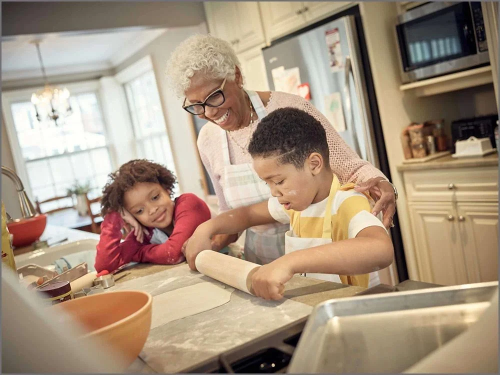 lifestyle advertising children and grandmother baking cookies.jpg