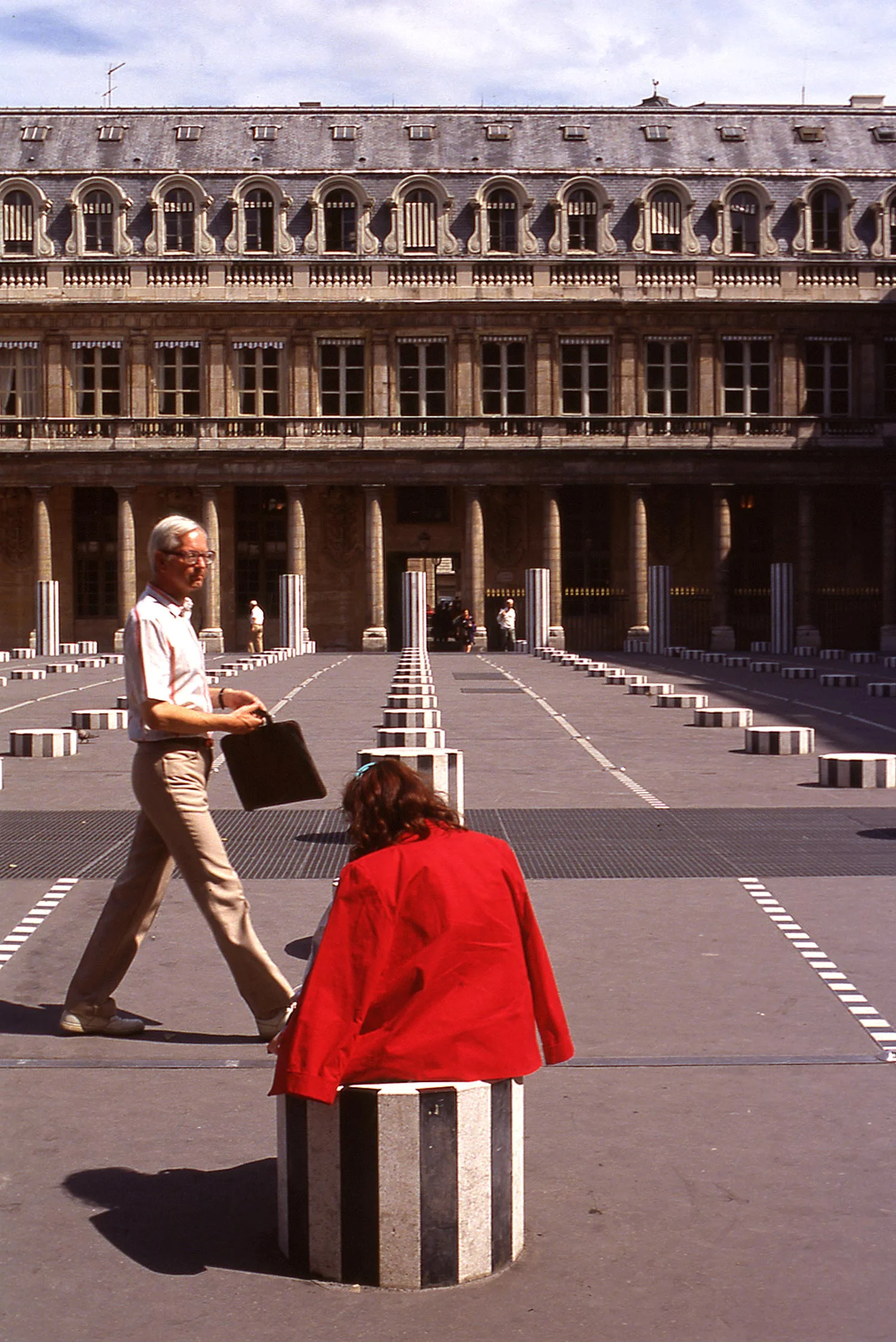 red-cape-lady-on-paris-plaza.jpg