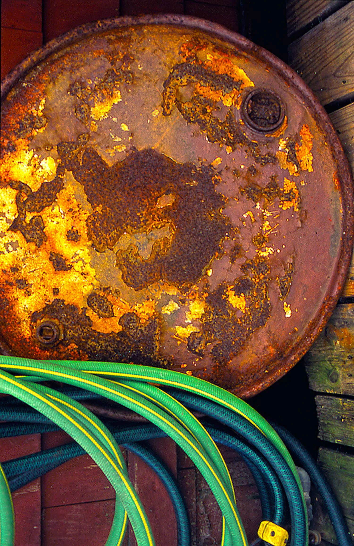 rusted-steel-barrel-and-hose.jpg