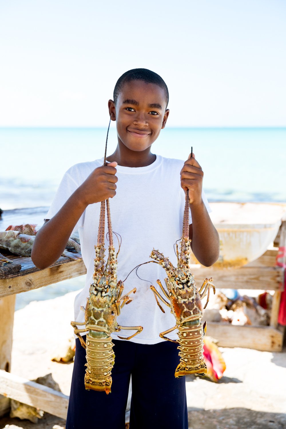 decenzo-angela-san-francisco-commercial-photographer-boy-holding-spiny-lobsters-20170331_MG_8627.jpg