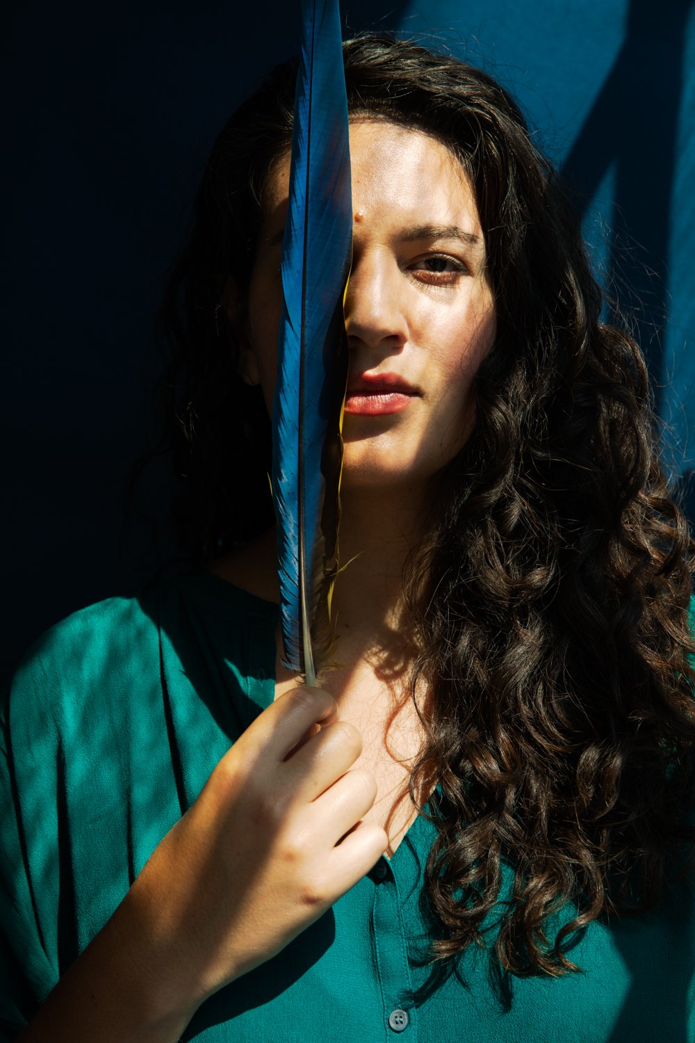 decenzo-angela-san-francisco-commercial-photographer-woman-green-blouse-blue-feather-20190826__MG_7155.jpg