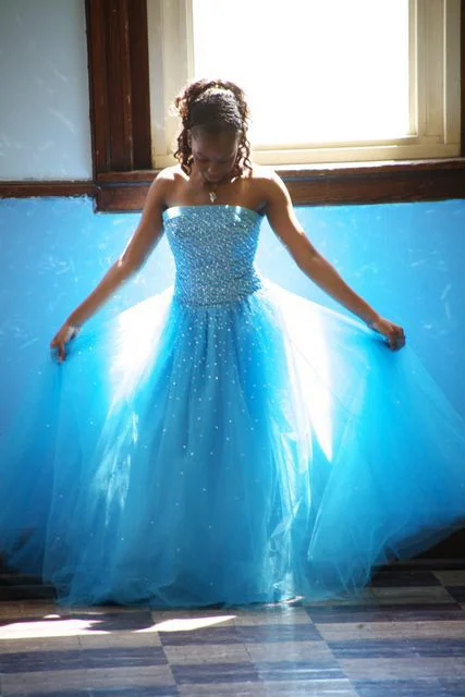 Girl in beautiful blue dress.