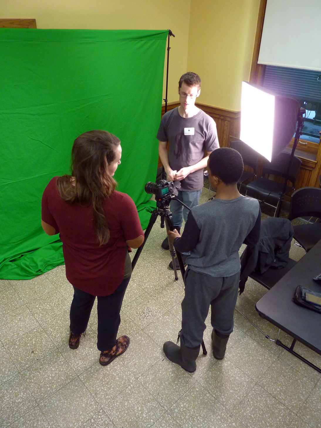 Lauren Travers (left) and Jeff Lassahn (back) showed green screen animation and lighting to students at the Live Action Filmmaking workshops.