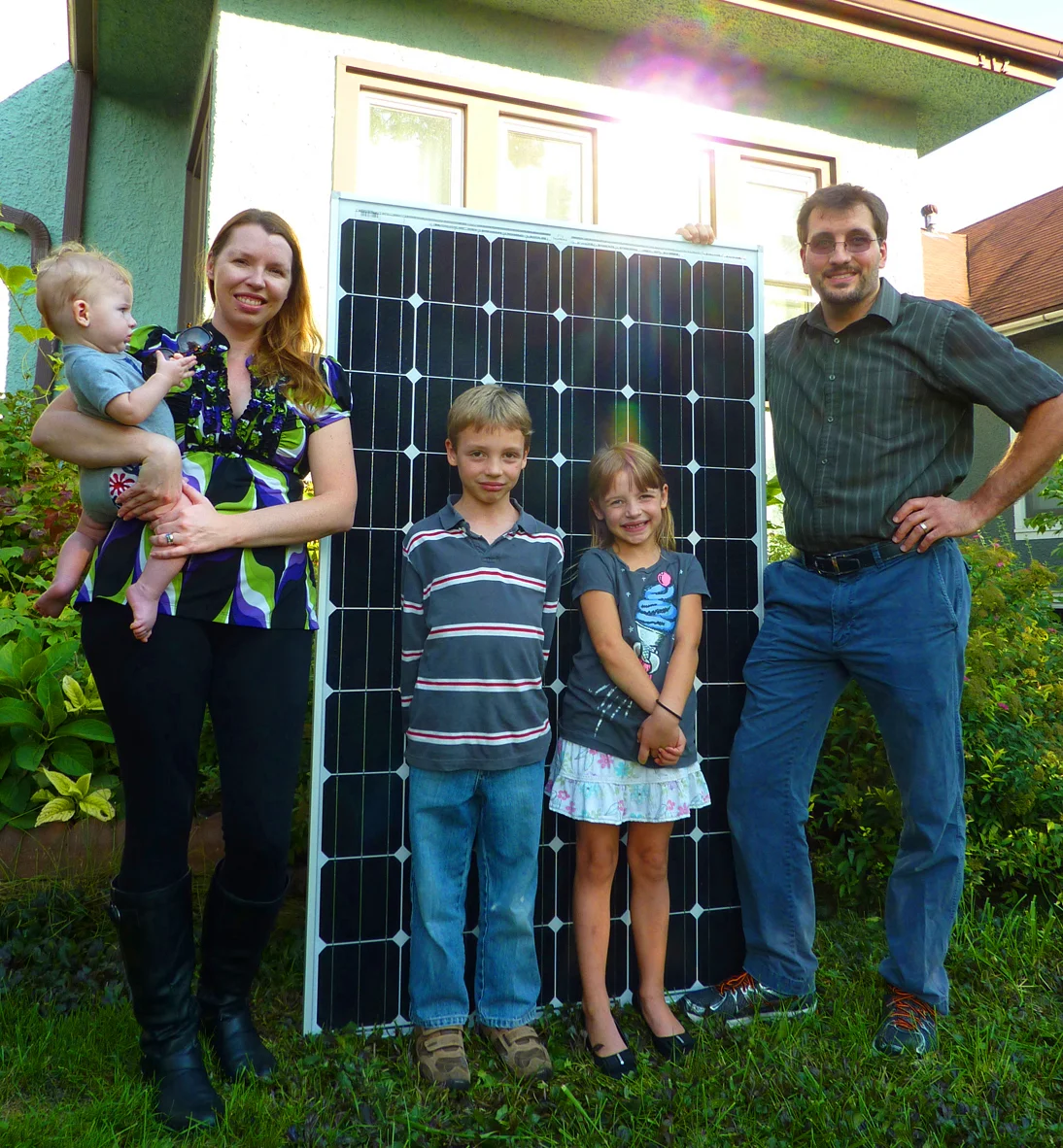 The Crystal and Alan Prechel Family have 29 solar panels, 4 chickens, and 2 electric cars, in addition to 3 adorable children.