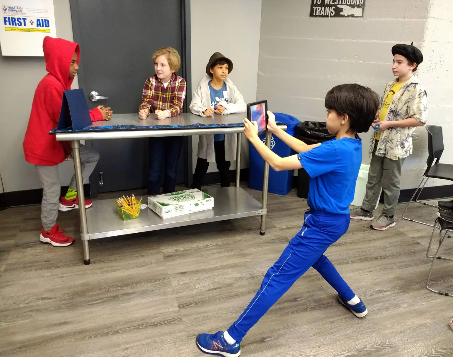 Students in grades 3 through 8 use their iPads and cell phones to shoot footage for narrative films about environmental topics: energy, food, transportation, waste, water, or open space/ecosystems.