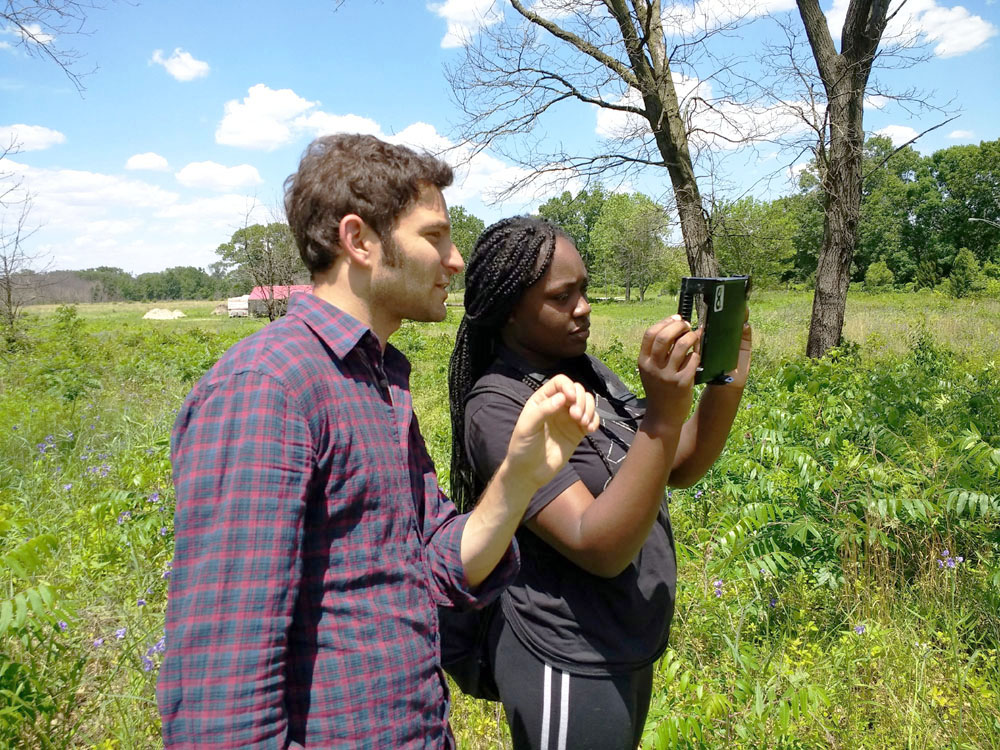 Matt Wechsler helps Brianna Jackson with filming.