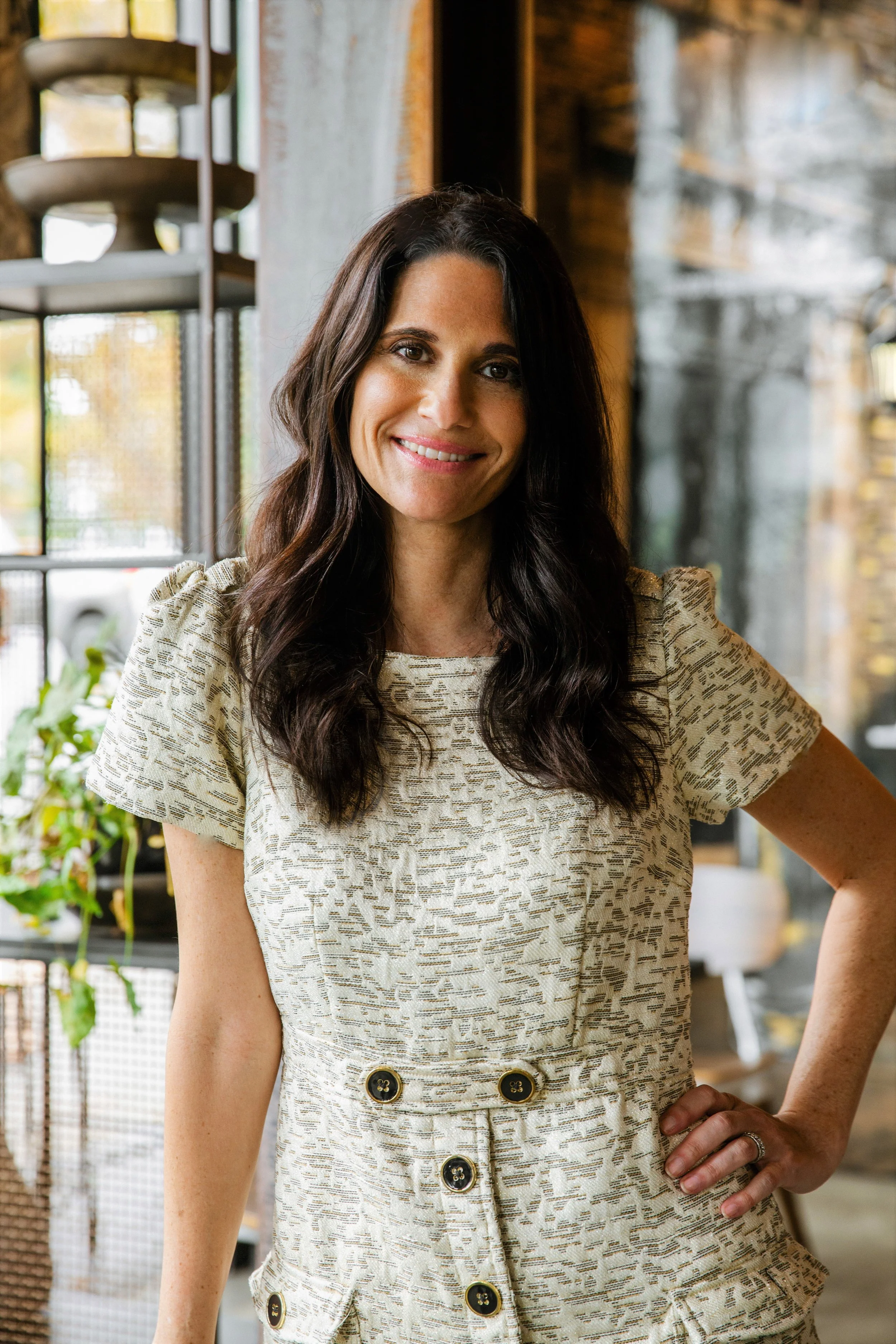 Portrait of Madeleine Perez in a bright interior setting.
